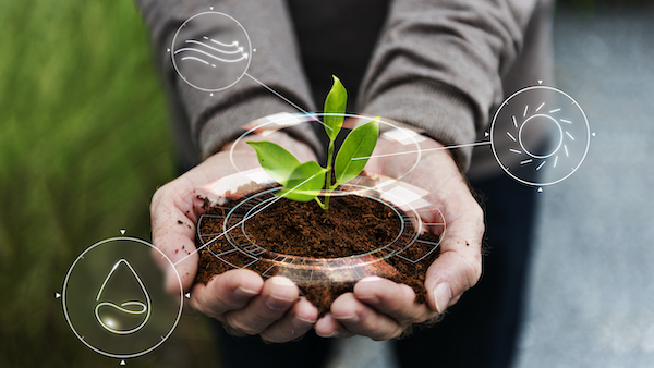 Smart agriculture IoT with hand planting tree background