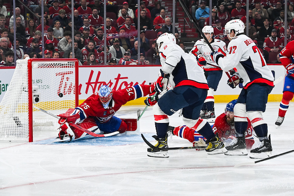 MONTREAL, QC - APRIL 25: Washington Capitals left wing Alex Ovechkin (8) scores a goal against Montreal Canadiens goalie Jakub Dobes (75) during game three of the first round of the 2025 Stanley Cup Playoffs between the Washington Capitals and the Montreal Canadiens on April 25, 2025, at Bell Centre in Montreal, QC (Photo by David Kirouac/Icon Sportswire)